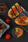 Pide mit Mangold-Tomaten-Füllung Pide mit Mangold-Tomaten-Füllung